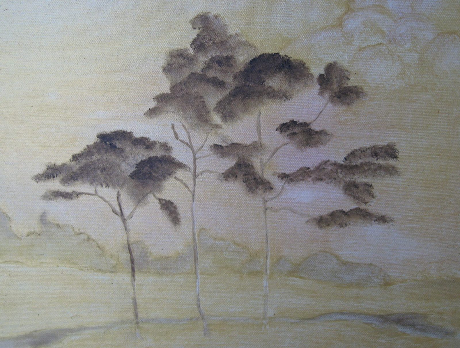 Delicate, feathery trees rising from a soft sepia mist.